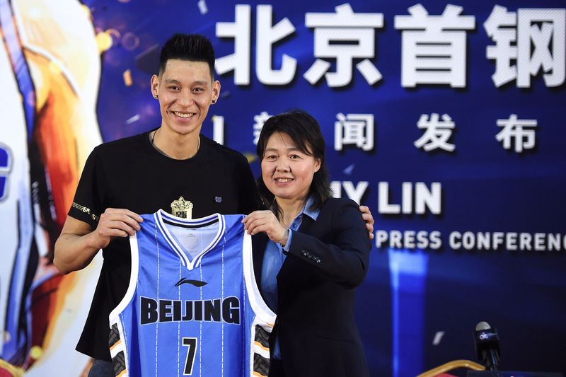 FILE PHOTO: Former NBA star Jeremy Lin poses with his