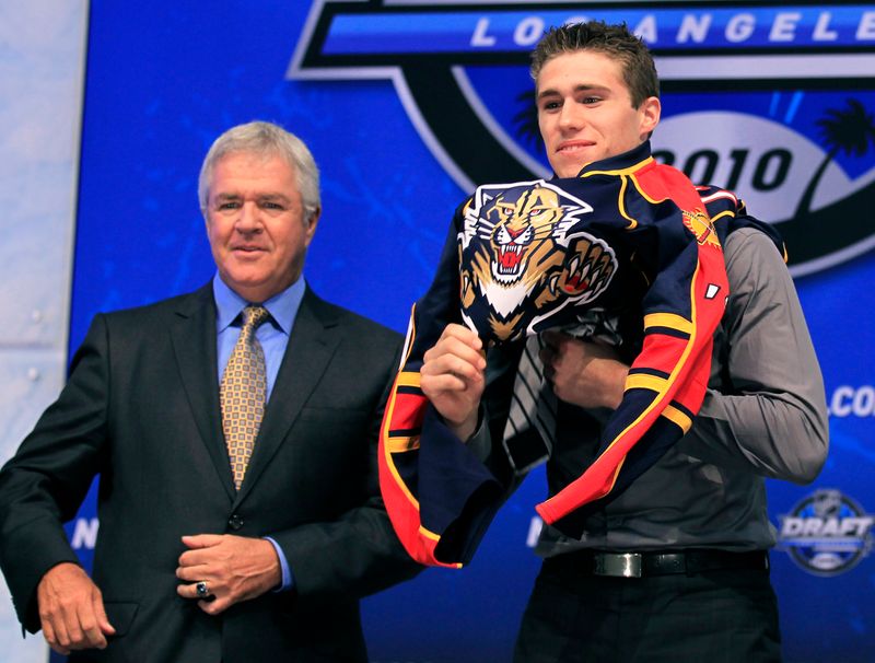 Florida Panthers’ pick Howden puts on the team jersey as