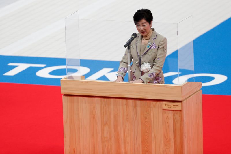 Tokyo’s Governor Yuriko Koike delivers a speech during the grand