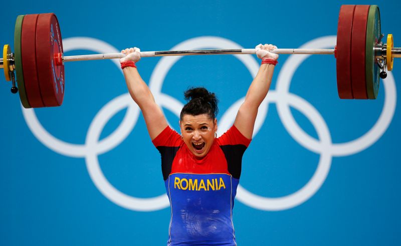 Romania’s Roxana Daniela Cocos competes on the women’s 69Kg Group