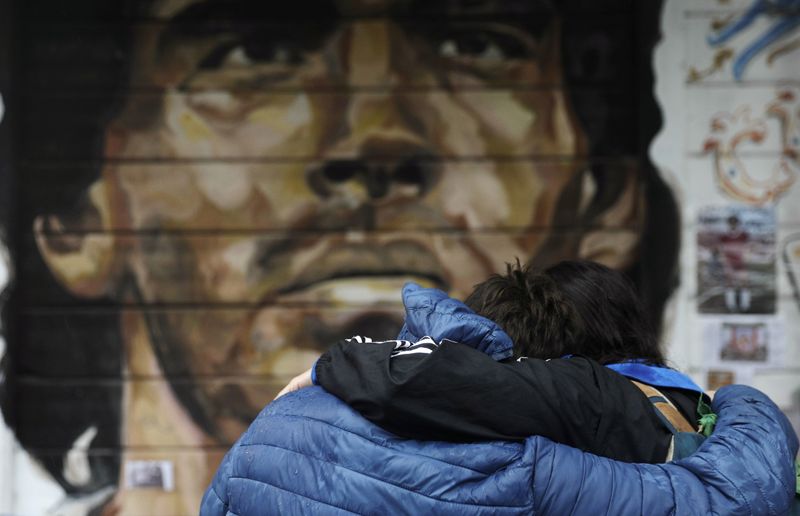 People mourn the death of soccer legend Diego Armando Maradona,