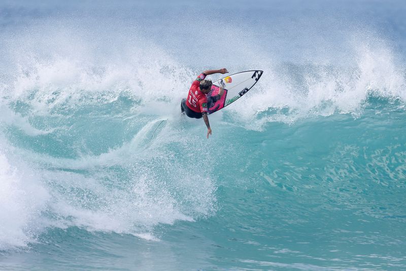 FILE PHOTO: Italo Ferreira from Brazil surfs a wave during