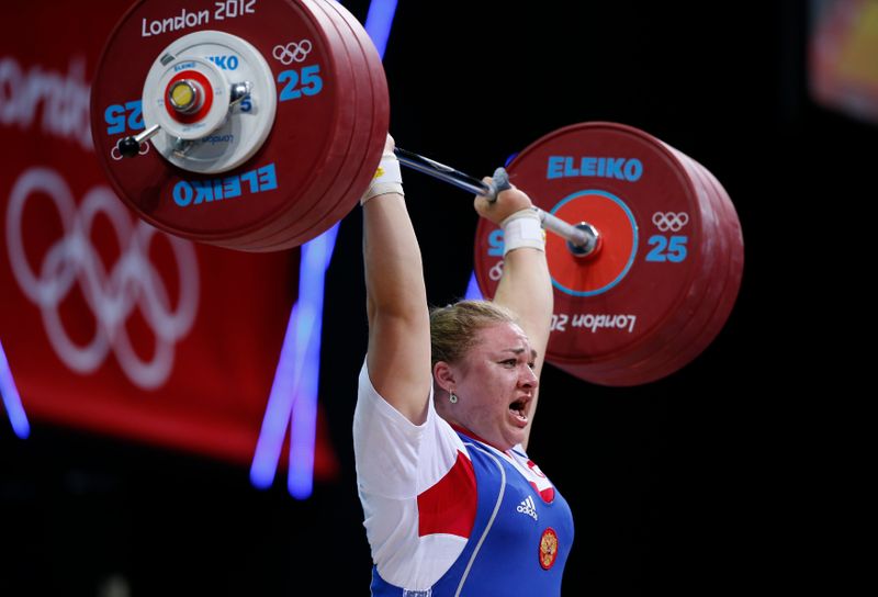 Russia’s Tatiana Kashirina competes in the women’s +75kg group A