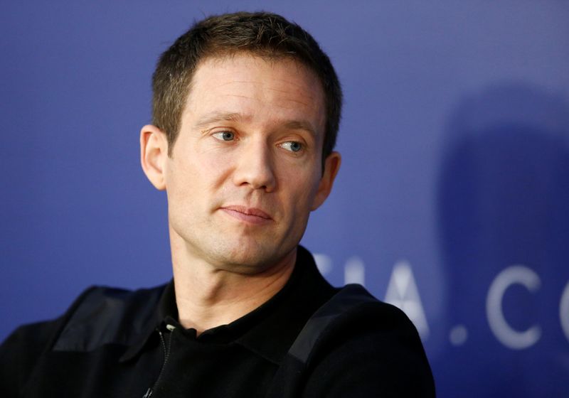 FILE PHOTO: World Rally Champion Ogier listens during the FIA