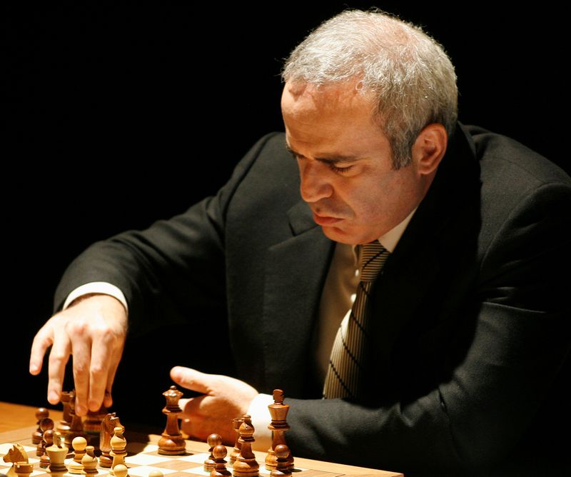 FILE PHOTO: Former chess World Champions Kasparov makes a move