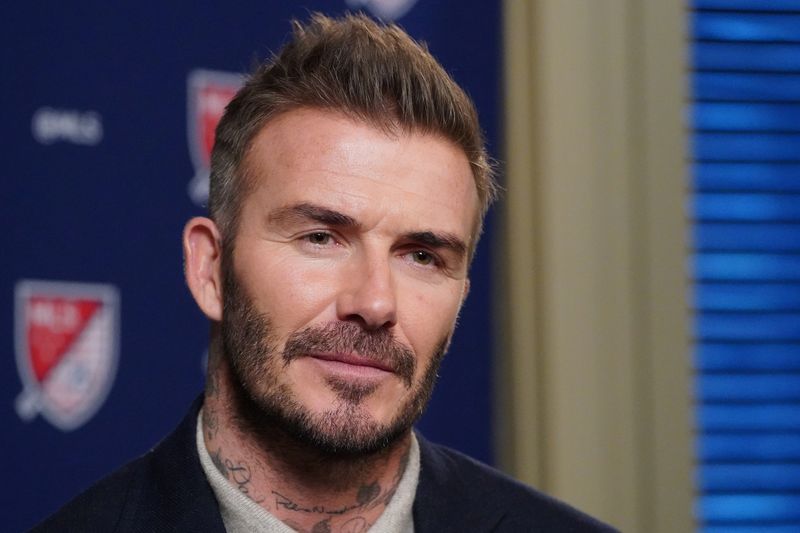 Former soccer player and MLS team owner David Beckham speaks