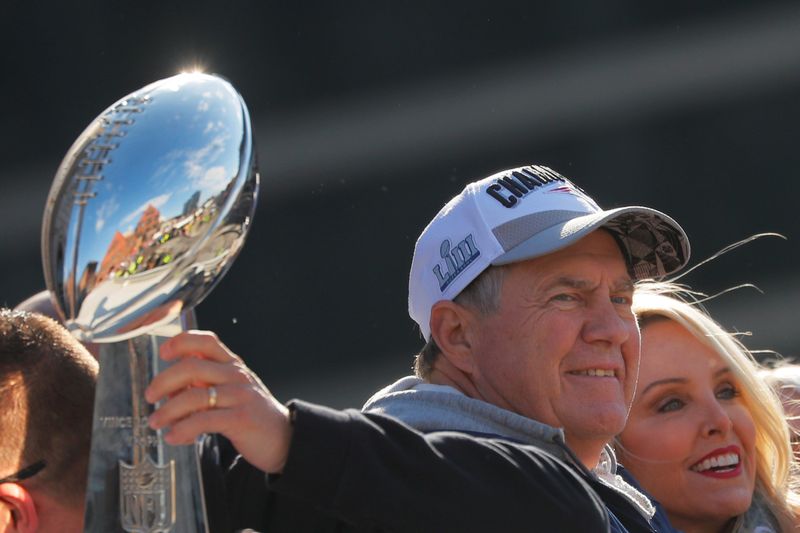 New England Patriots head coach Bill Belichick smiles during a