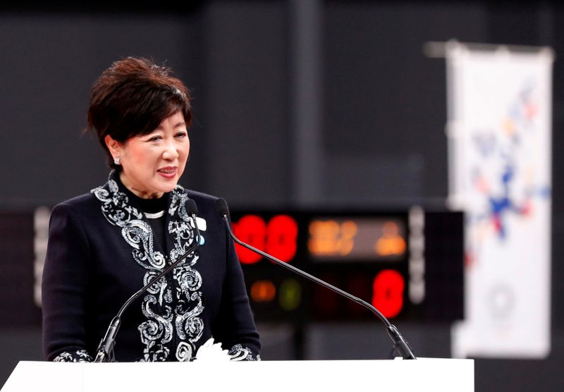 FILE PHOTO: Tokyo governor Yuriko Koike speaks at the opening