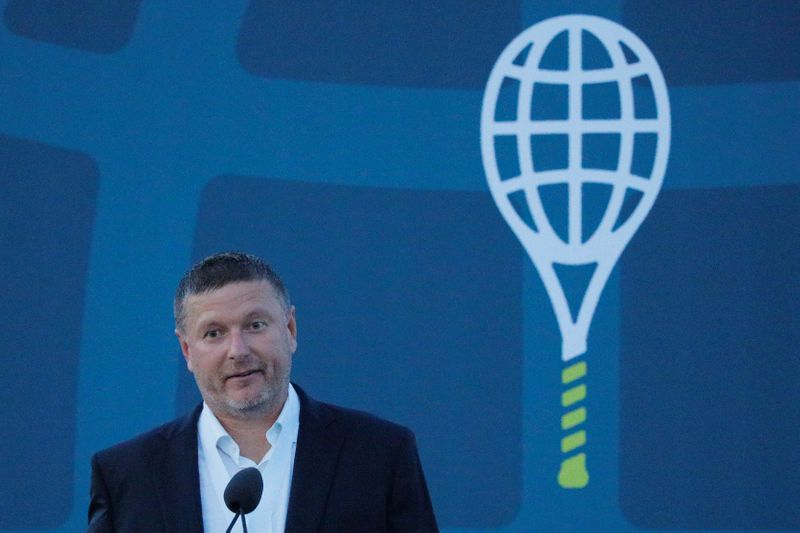 Yevgeny Kafelnikov of Russia speaks as he is inducted into