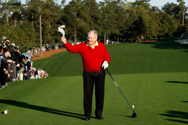 Honorary starter Jack Nicklaus of the U.S. tees off during