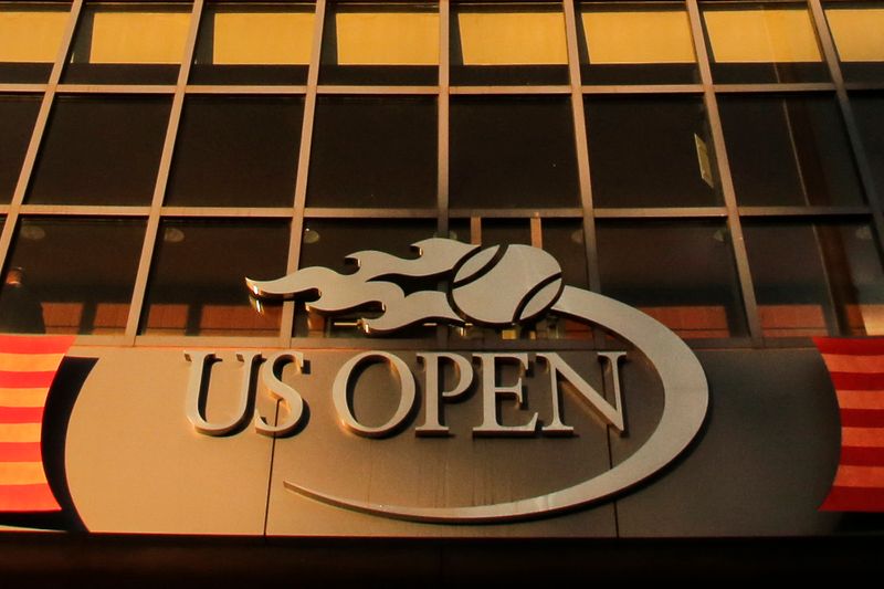 FILE PHOTO: The sun reflects off the U.S. Open sign
