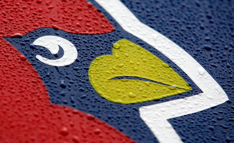 Rain cover Cardinals logo before Game 4 of World Series