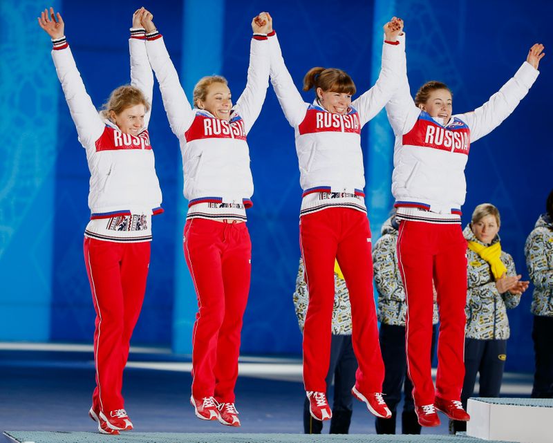 Silver medallists Russia’s Romanova, Zaitseva, Shumilova and Vilukhina jump on