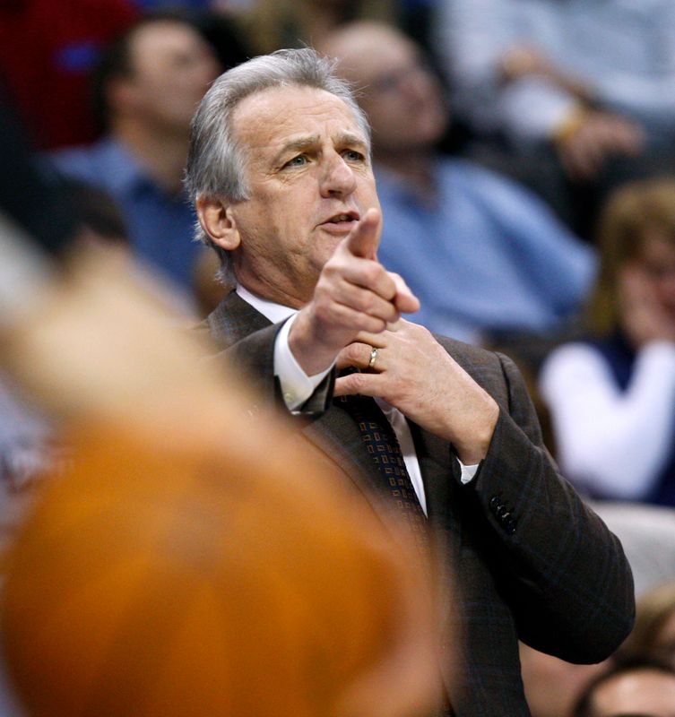 Sacramento Kings head coach Westphal signals to his players in