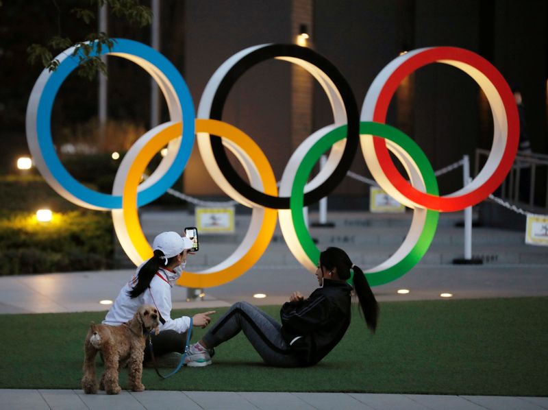 Olympic rings are seen near the National Stadium in Tokyo