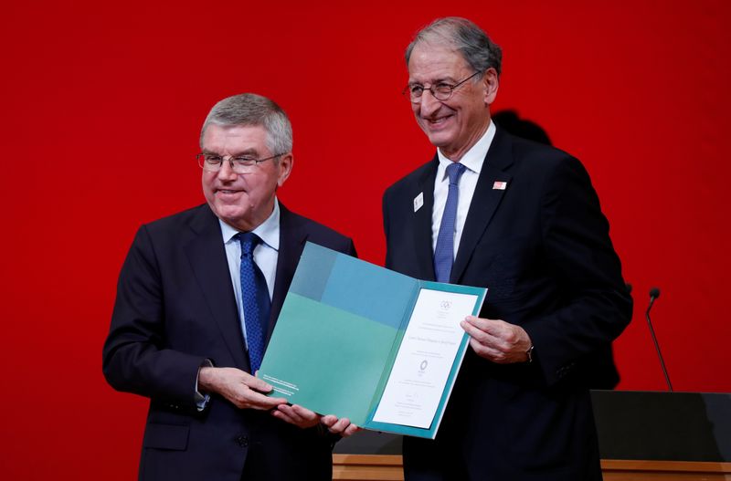 IOC President Bach presents invitation to Olympic Games to President