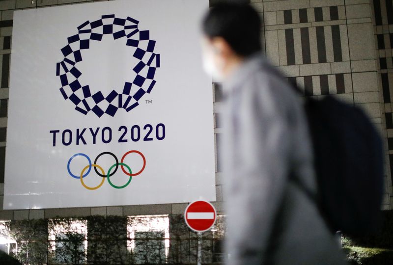 The logo of Tokyo 2020 Olympic Games is seen through