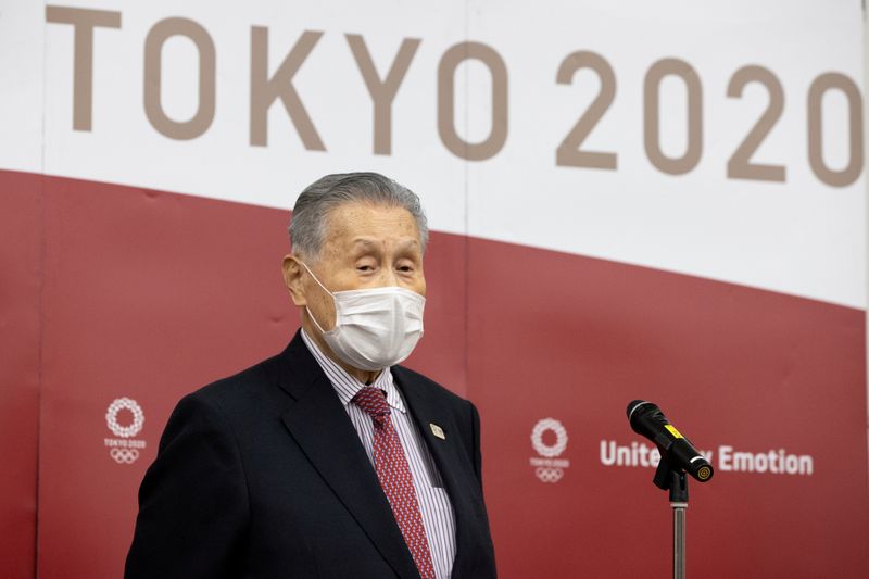 FILE PHOTO: Olympics-Tokyo 2020 officials speak to media after video