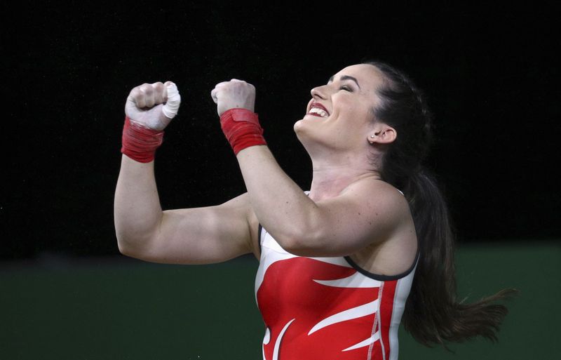 FILE PHOTO: Sarah Davies reacts in the women’s 69kg final