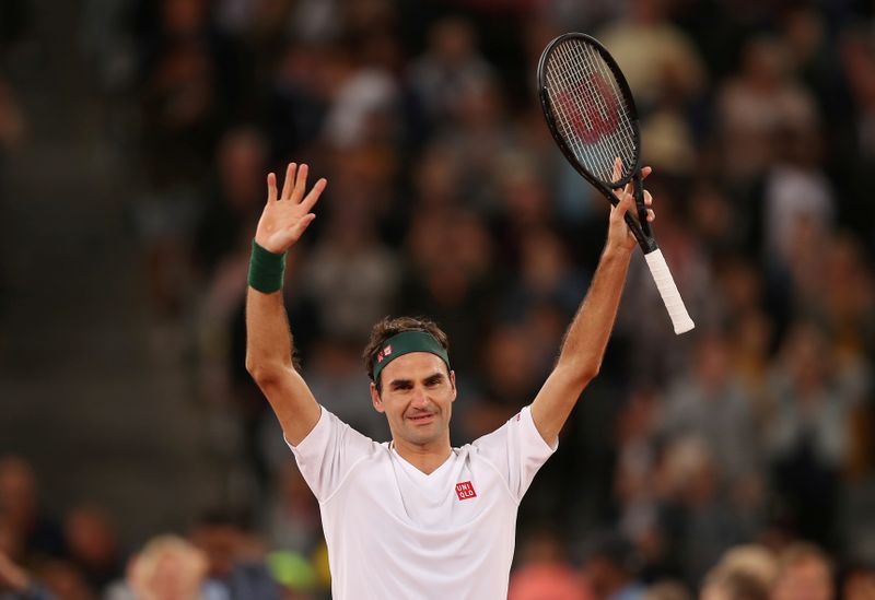 FILE PHOTO: Roger Federer celebrates after winning an exhibition match