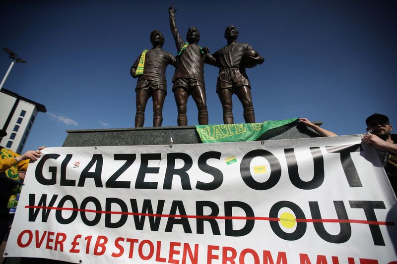 FILE PHOTO: Manchester United fans protest against owners after failed