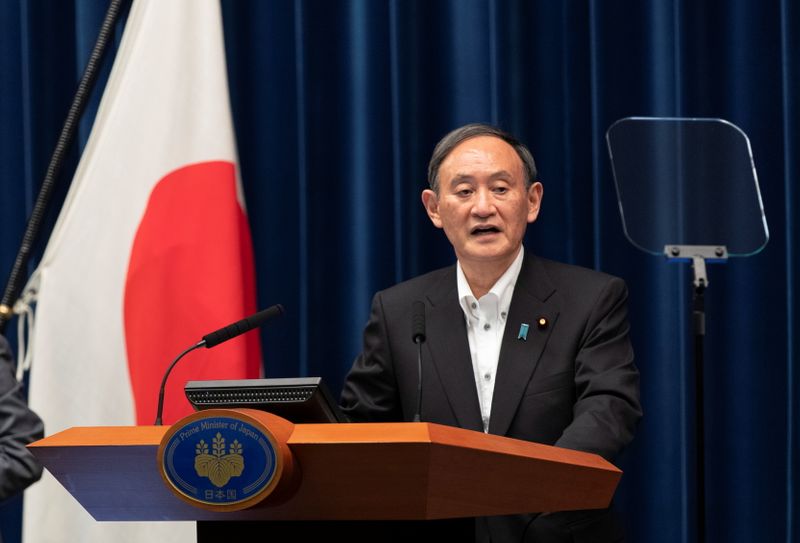 Japanese Prime Minister Suga holds a news conference in Tokyo