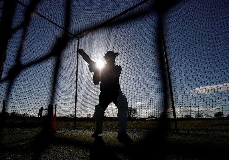 A player from Ashley Cricket Club practices his batting during