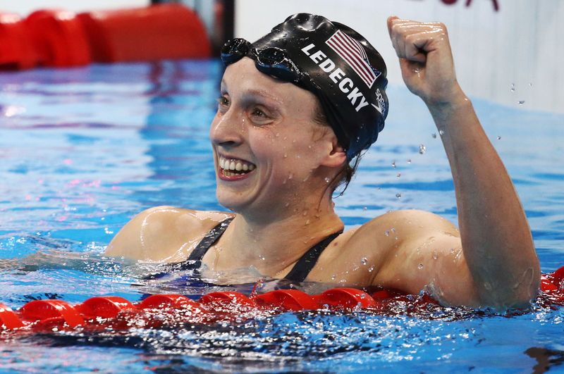 FILE PHOTO: Katie Ledecky (USA) reacts after winning and setting