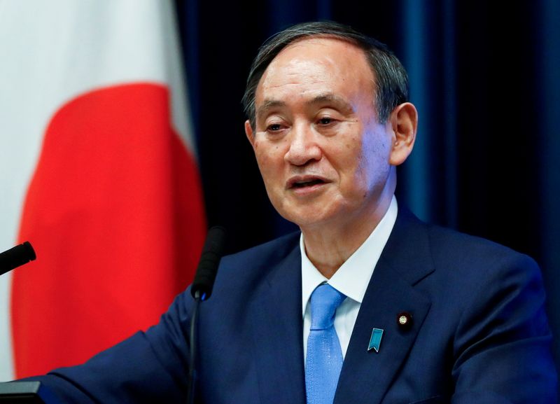 FILE PHOTO: Japan’s Prime Minister Yoshihide Suga attends a news