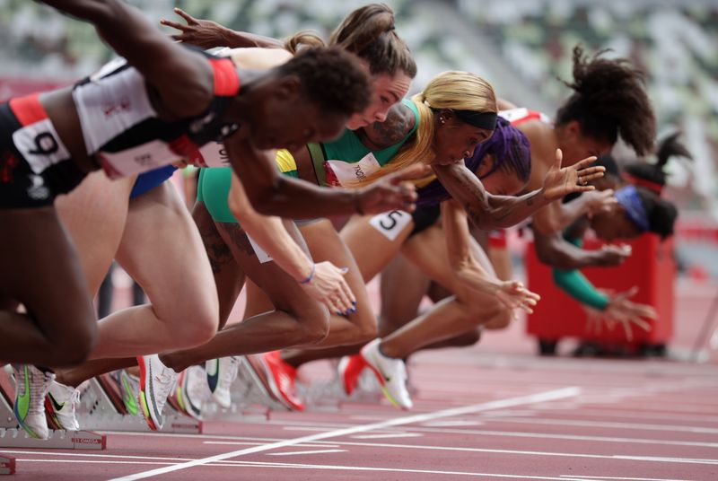 Athletics – Women’s 100m – Round 1
