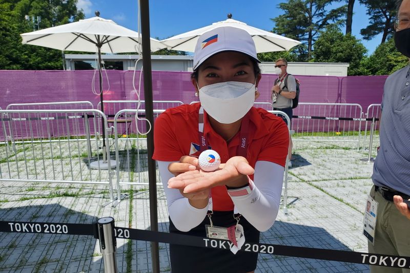 Bianca Pagdanganan, a golfer from Philippines, shows off a ball