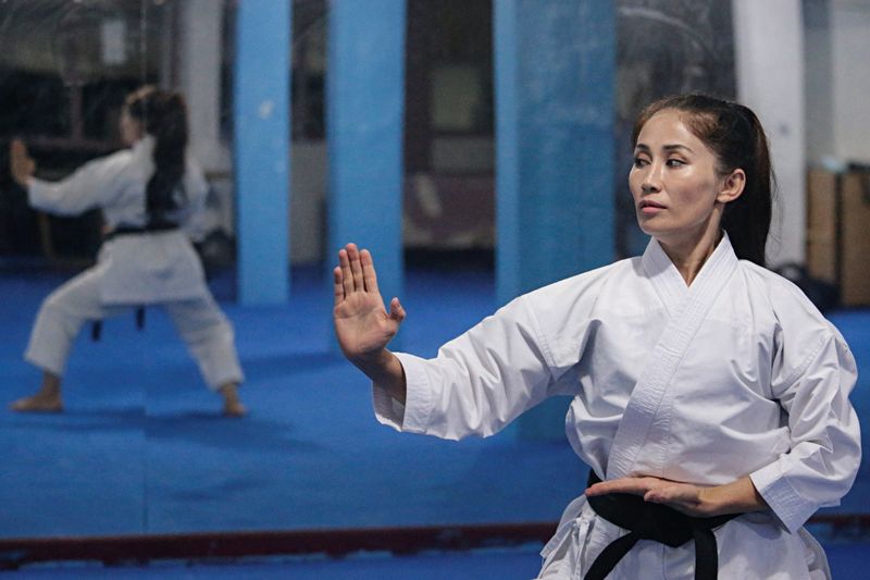 Meena Asadi, a 28-year-old former Afghan martial arts athlete practices
