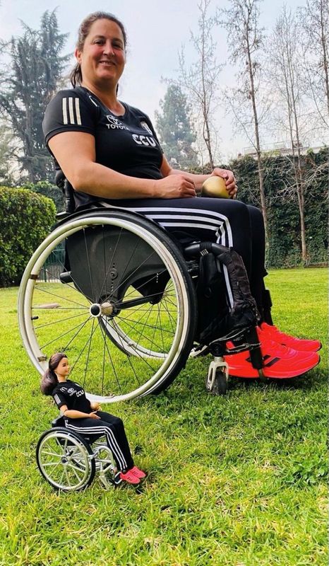 Francisca Mardones, Chilean wheelchair tennis player, poses with her Barbie