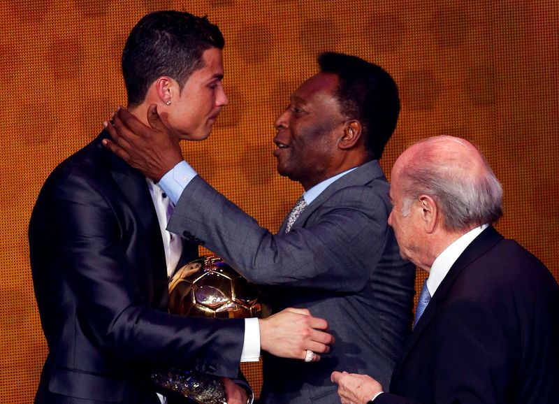 FILE PHOTO: Pele congratulates Portugal’s Cristiano Ronaldo