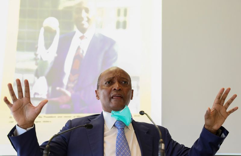 FILE PHOTO: South African billionaire Patrice Motsepe gestures during a