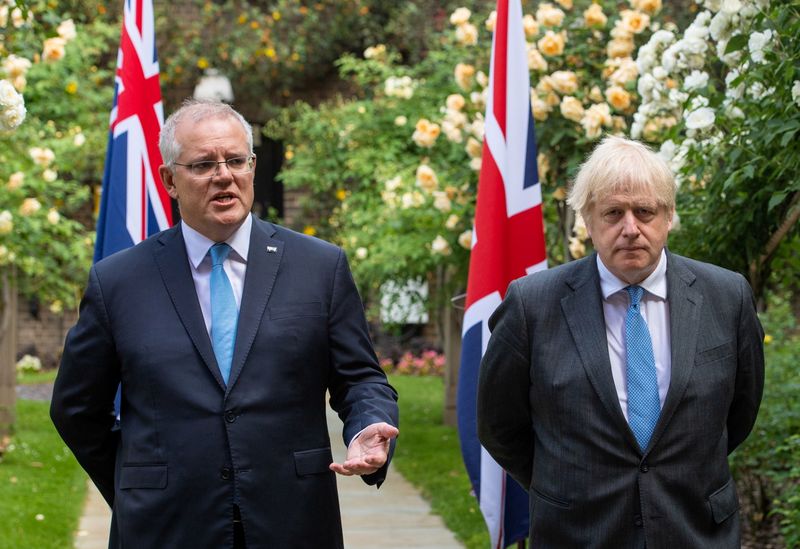FILE PHOTO: Britain’s PM Johnson and Australia’s PM Morrison meet