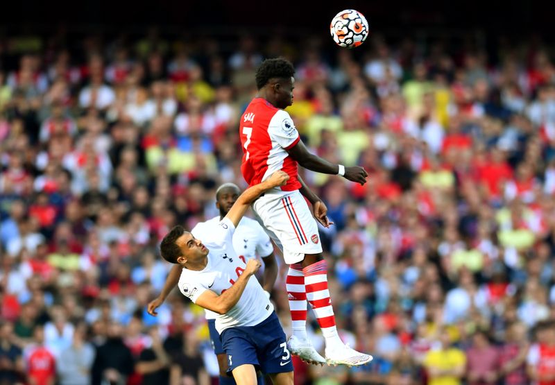 Soccer-Arsenal trounce Tottenham as resurgence continues