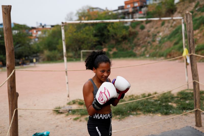 Dreaming of rings and medals: Boxing helps children in Sao