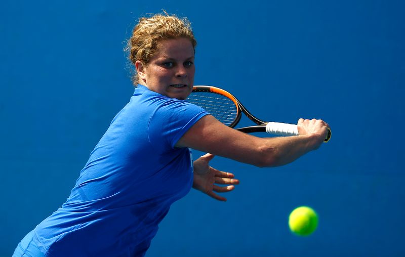 Belgium’s Kim Clijsters hits a shot during a practice session