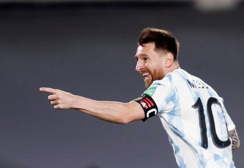 Soccer-Messi scores unusual goal as Argentina beat Uruguay 3-0