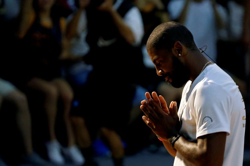 NBA player Kyrie Irving of the Cleveland Cavaliers reacts during