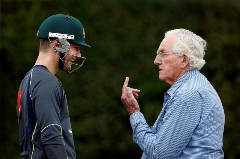 FILE PHOTO: Australia’s test cricket captain Michael Clarke listens to