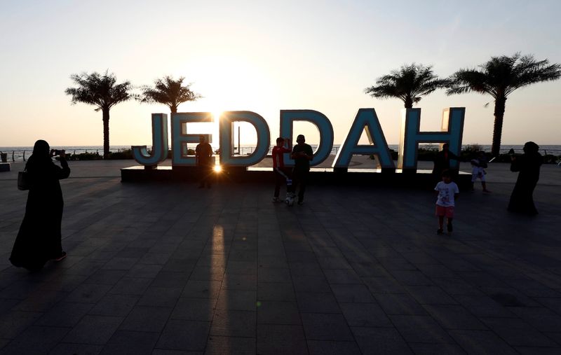 FILE PHOTO: People stand on the corniche in Jeddah