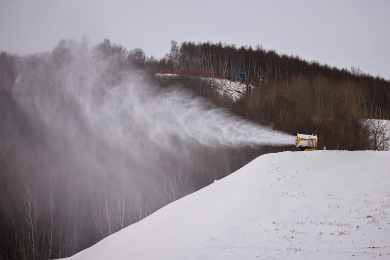 FILE PHOTO: A TechnoAlpin snow gun sprays snow onto a