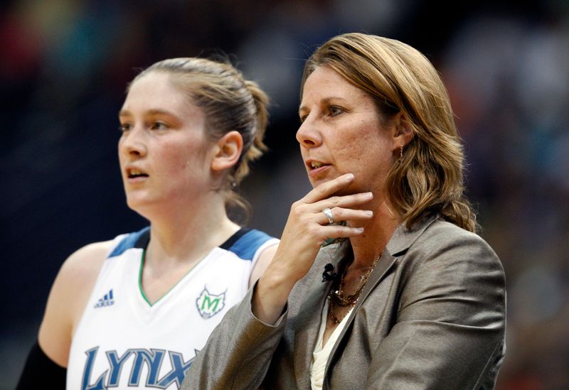 Lynx head coach Reeve speaks with Whalen during their WNBA