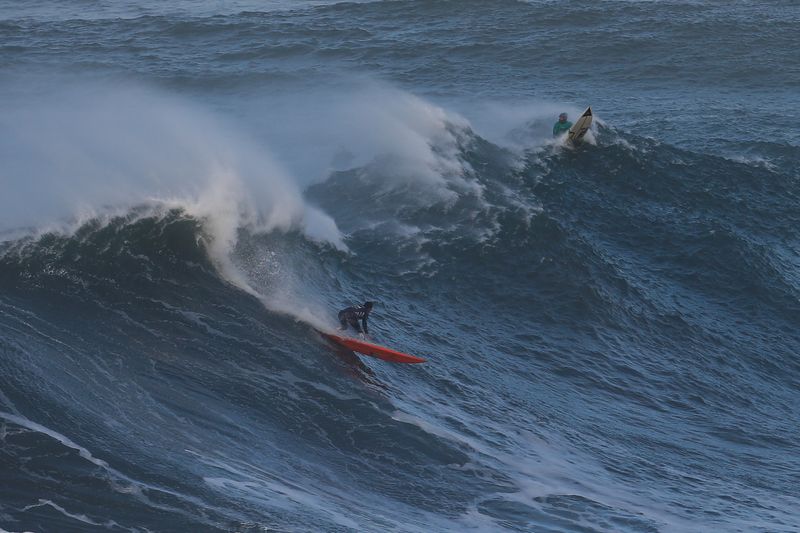 Brazilian big wave surfer Lucas Chianca surfs a wave during