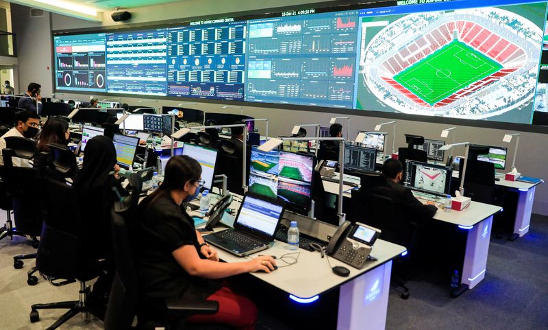 Employees work in Command and Control Centre for the FIFA