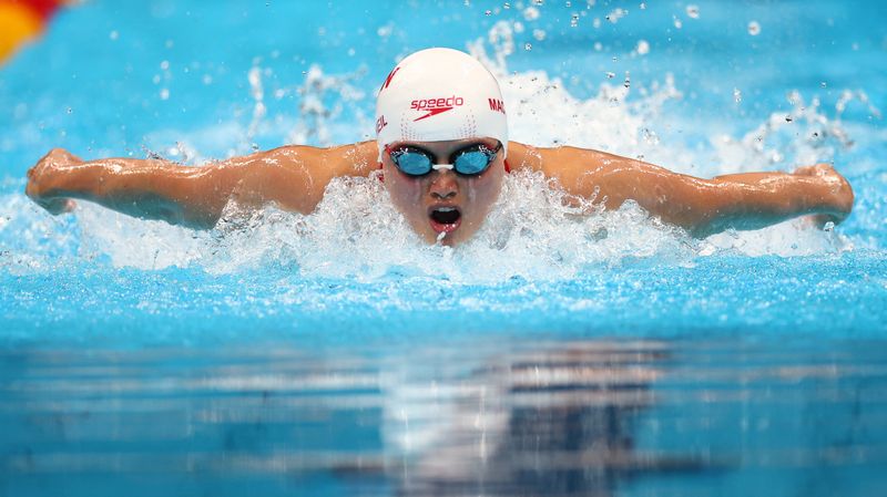 FILE PHOTO: Swimming – Women’s 100m Butterfly – Heats