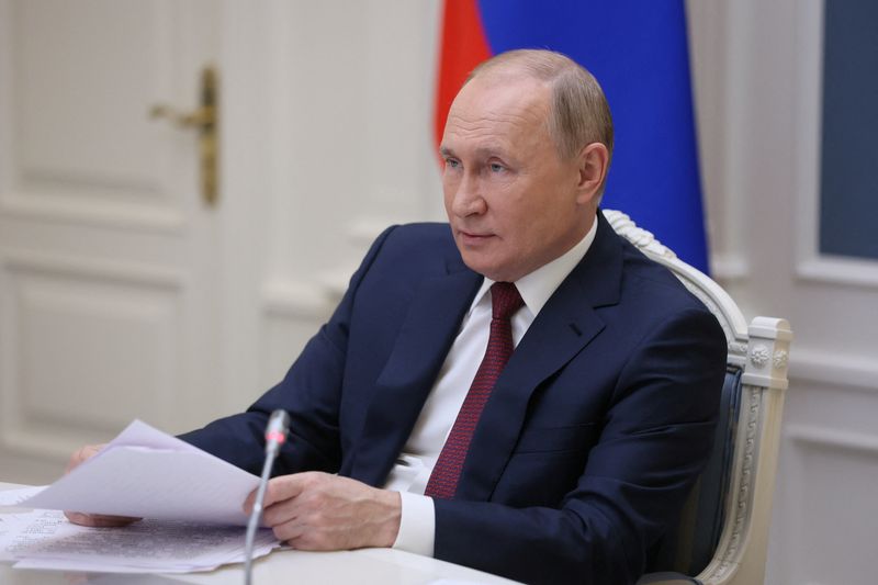 Russian President Vladimir Putin attends the VTB Capital Investment Forum