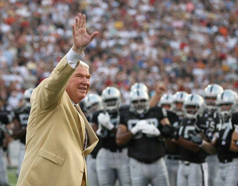 FILE PHOTO: Former Oakland Raiders’ coach John Madden waves to